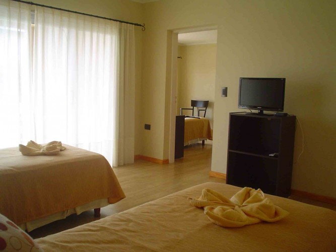 img/inmuebles/vista_2_camas_a_habitacion_cama_grande.jpg